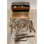 Wooden toolbox with drawer, containing a collection of hand tools including spanners, tap and dies,