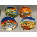 A set of four Poole pottery Four Seasons wall plates, each 15cm diameter, by Barbara Fürstenhojër.