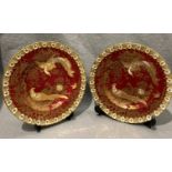 A pair of Royal Crown Derby red and gilt birds of Paradise plates ref: XIX, each 21.