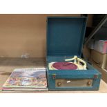 A Collard Conquest table top record player and fourteen LPs,