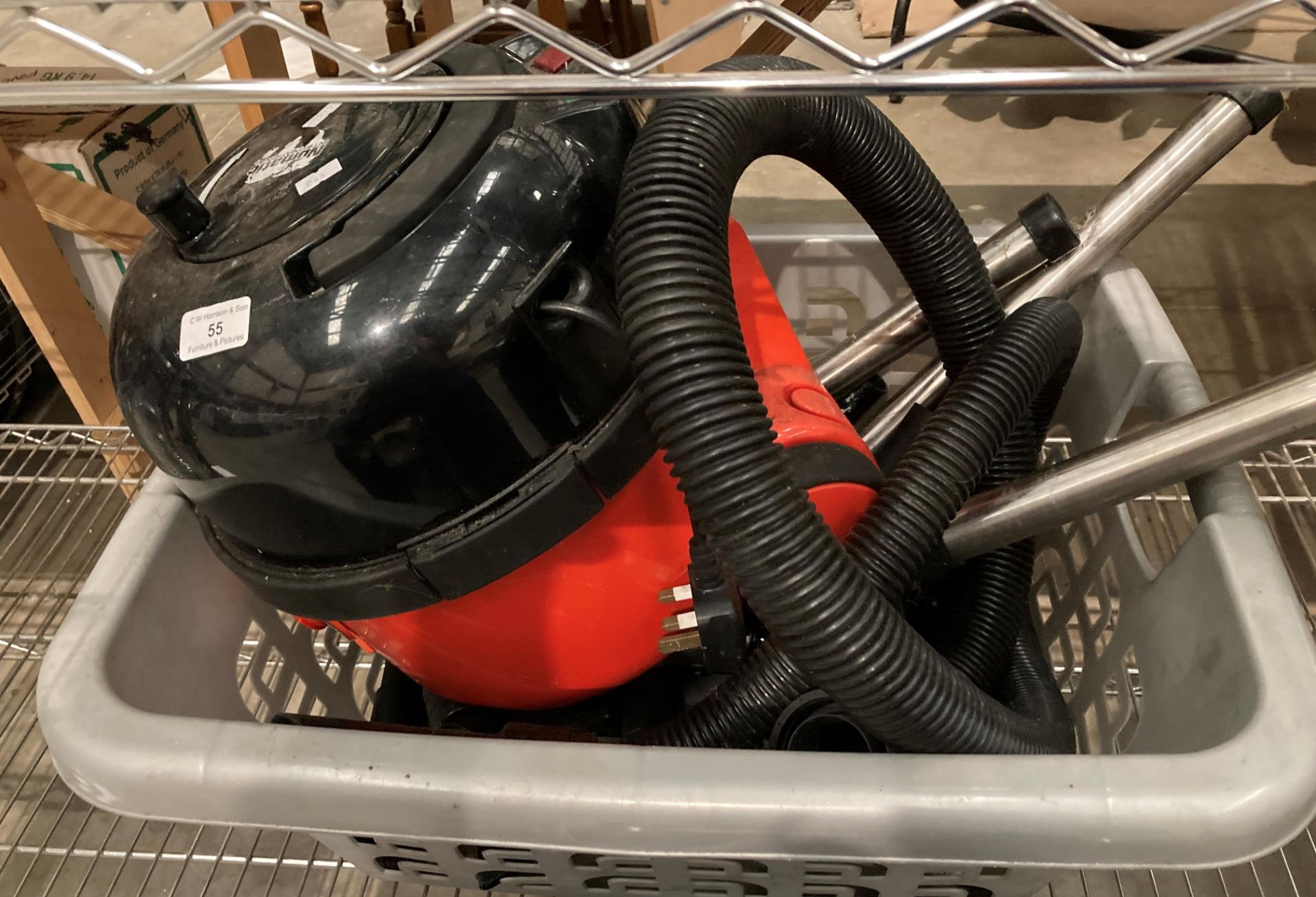 A Numatic Henry tub vacuum cleaner and accessories.