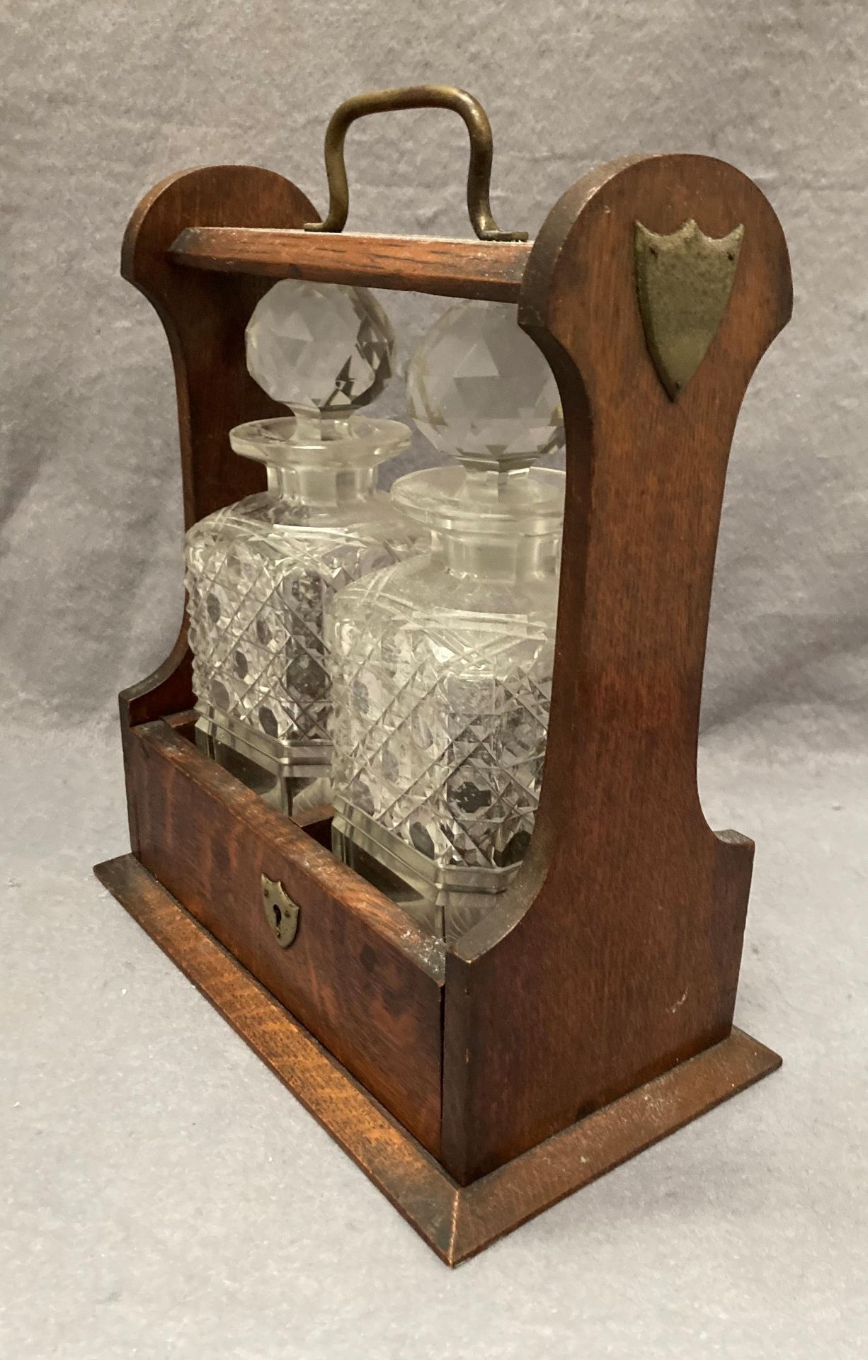 An oak two decanter tantalus, locked, - Image 2 of 2