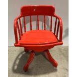 Red painted wooden swivel desk armchair