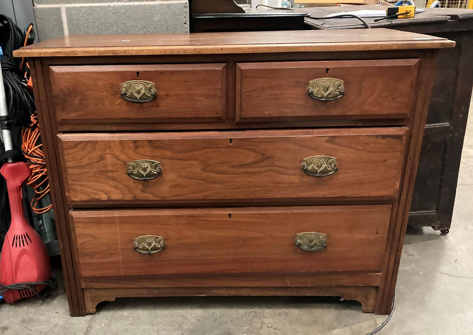 A stained mahogany four drawer (two long, two short) chest of drawers,