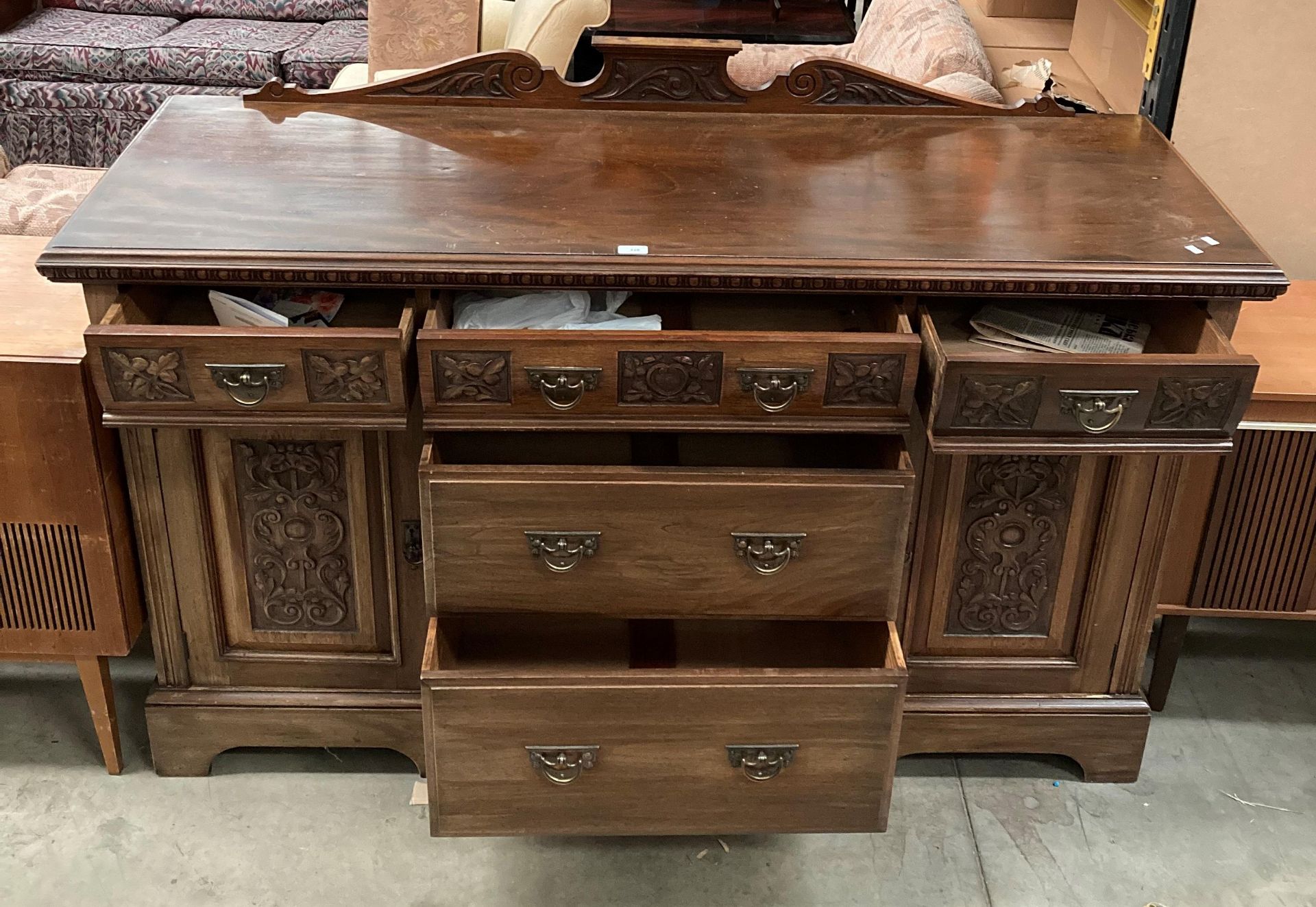 A late 19th century carved mahogany sideboard with five drawers and two cupboards, - Image 2 of 2