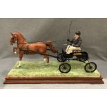 A Border Fine Arts scale limited edition model 'High Stepping', of a hackney horse and gig,