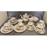 Twenty-nine pieces of Royal Albert Lavender Rose part tea service including teapot