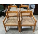 A set of four armchairs with rush seats,