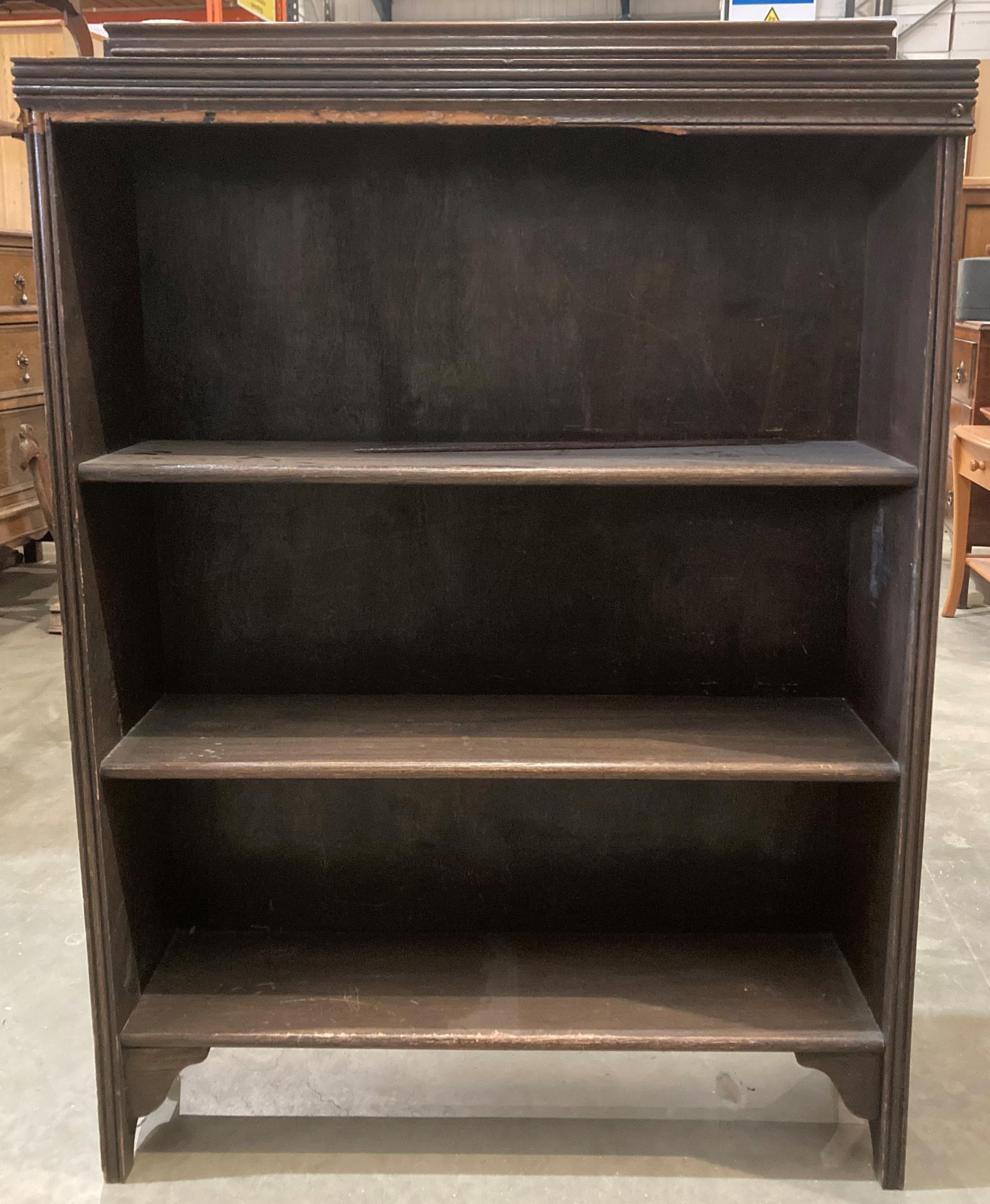A small oak three shelf open bookcase (trim broken), 78cm x 107cm high.