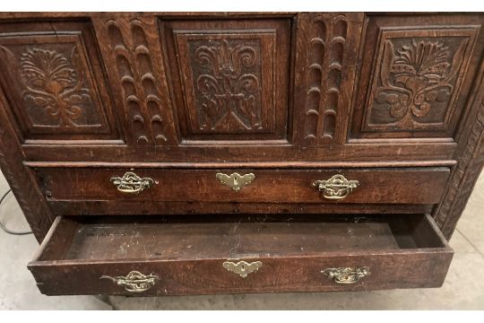 An oak kist with carved three panel front over two drawers, lettered to either side of lock FA1741, - Image 5 of 15