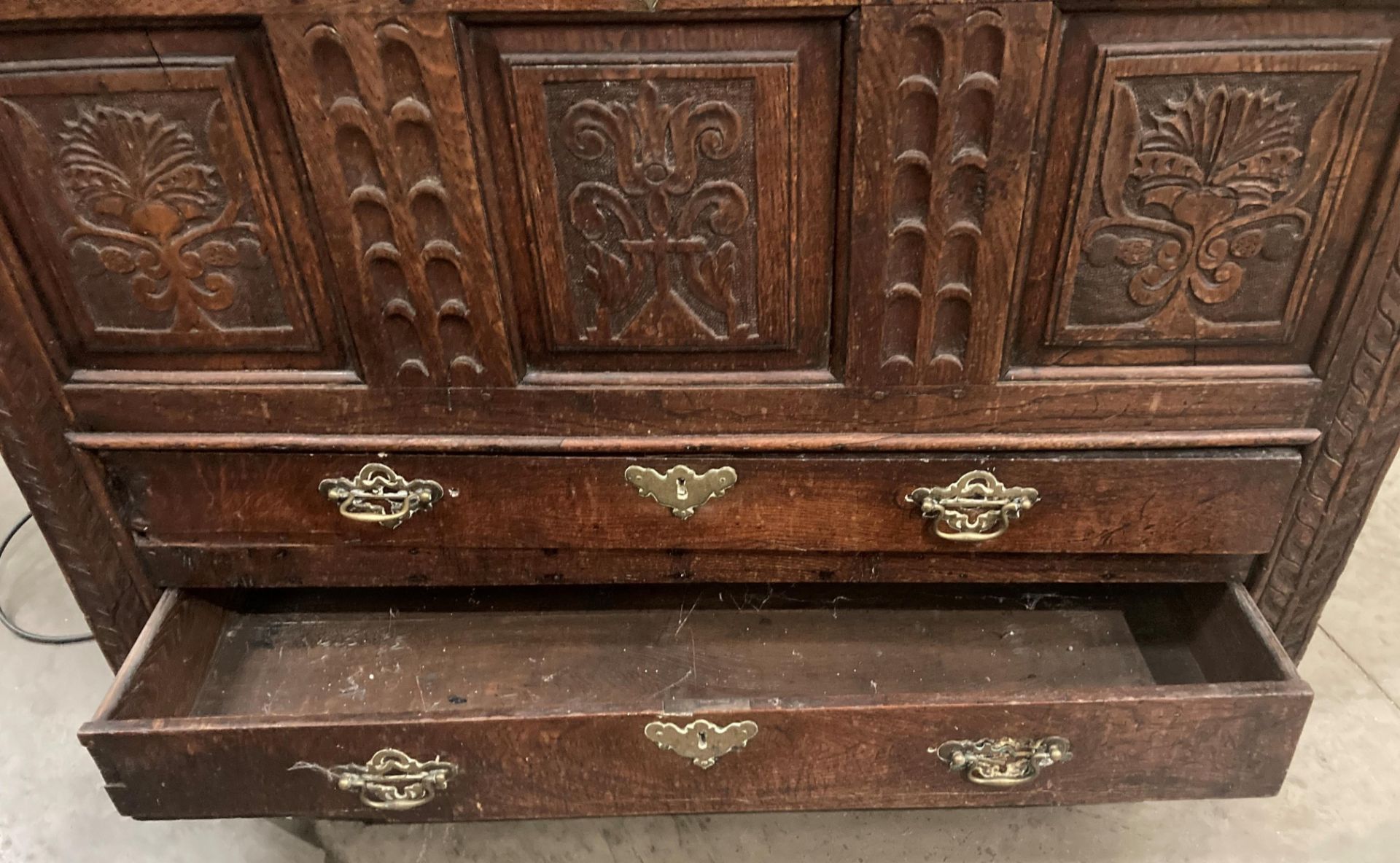 An oak kist with carved three panel front over two drawers, lettered to either side of lock FA1741, - Image 5 of 15