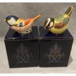 Two Royal Crown Derby paperweights, both with gold coloured stoppers and boxes,