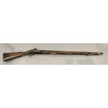 A 19th century seven bore percussion gun converted from a flintlock,