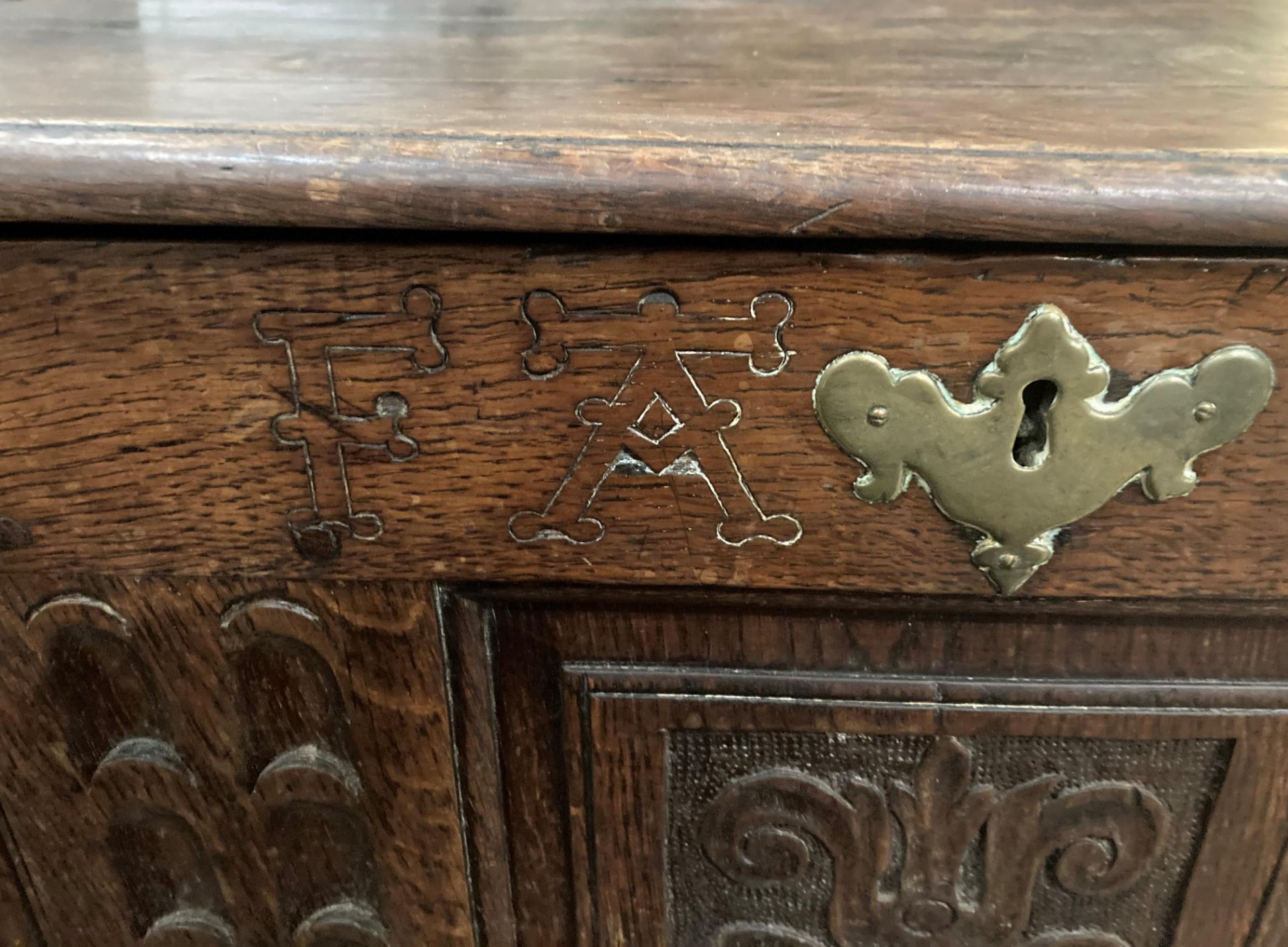 An oak kist with carved three panel front over two drawers, lettered to either side of lock FA1741, - Image 2 of 15