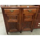 An oak two door, two drawer sideboard,