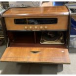 An Interlude Stereophonic teak cased radiogram, 78cm x 69cm x 79cm high, tested,