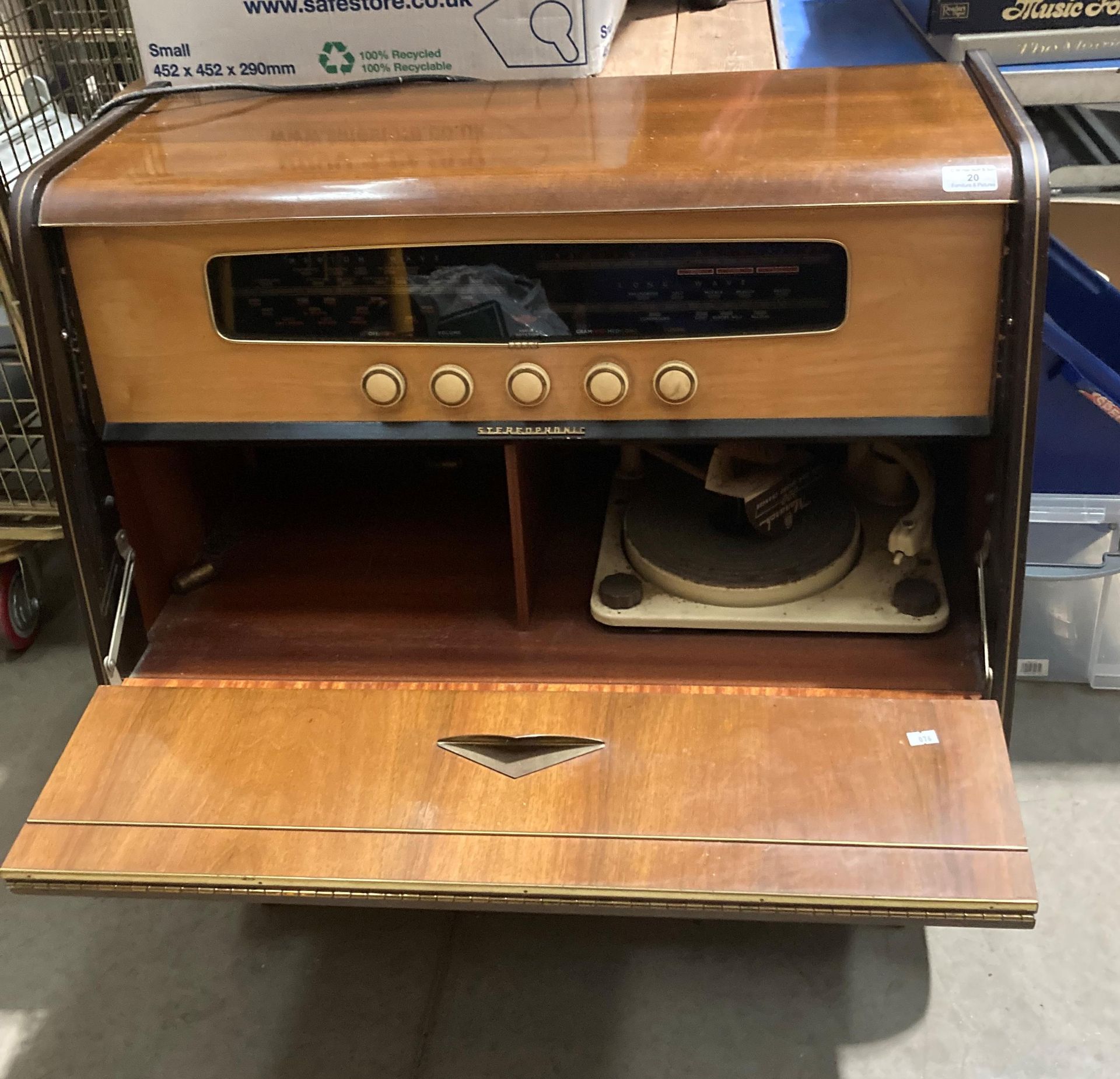 An Interlude Stereophonic teak cased radiogram, 78cm x 69cm x 79cm high, tested,