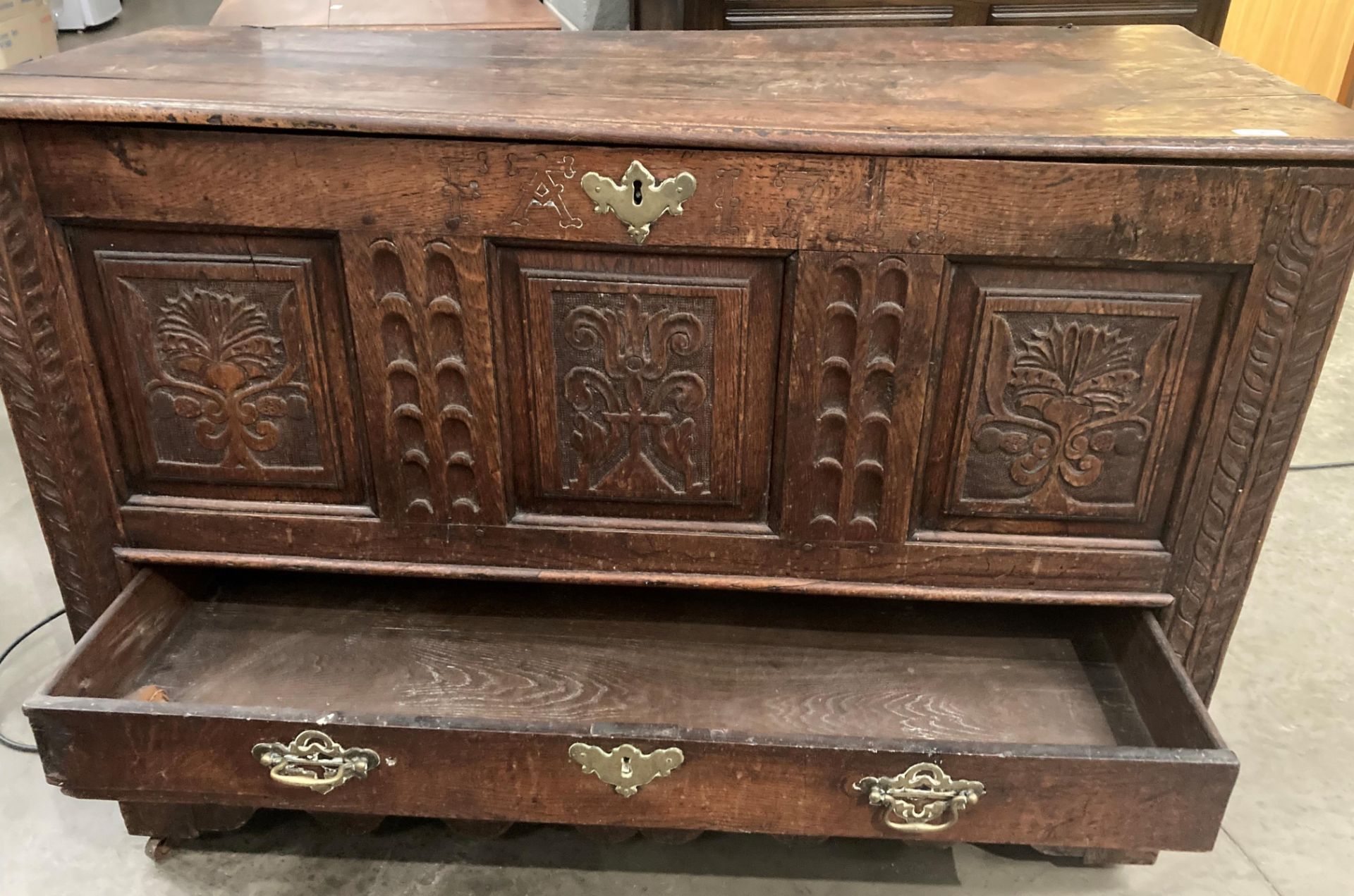 An oak kist with carved three panel front over two drawers, lettered to either side of lock FA1741, - Image 4 of 15