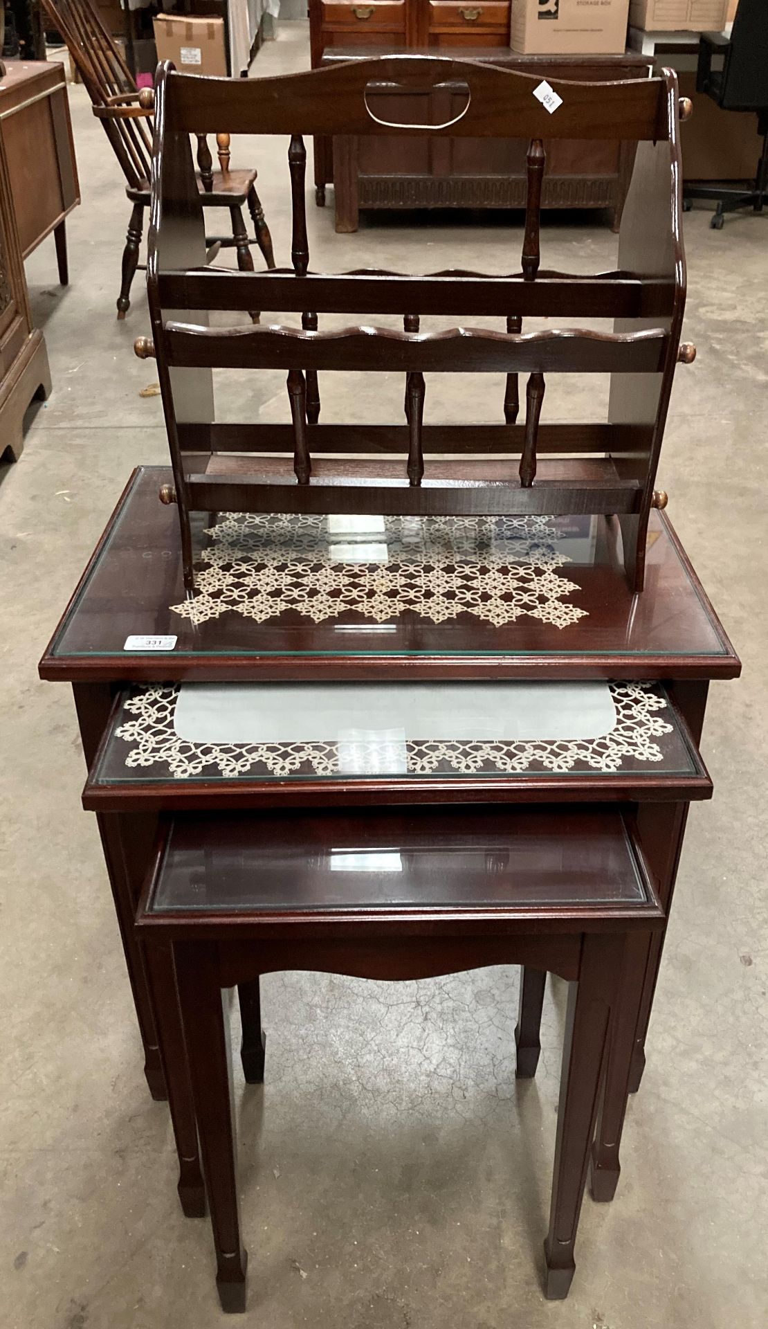 A nest of three mahogany tables with glass protective tops and a mahogany magazine rack - Image 2 of 2