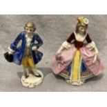 A pair of small Continental porcelain figurines, a man and woman, each 8.