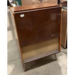 A KB Junior walnut cased radiogram, 60cm x 38cm x 88cm high (Plug cut off,