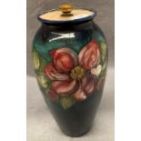 A Moorcroft ovoid pottery floral vase, 34cm high, the top converted as a lamp.