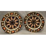 Two Royal Crown Derby Imari patterned plates, each 16cm diameter.