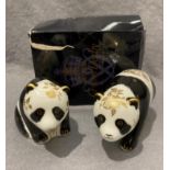 Two Royal Crown Derby paperweights with gold coloured stoppers,