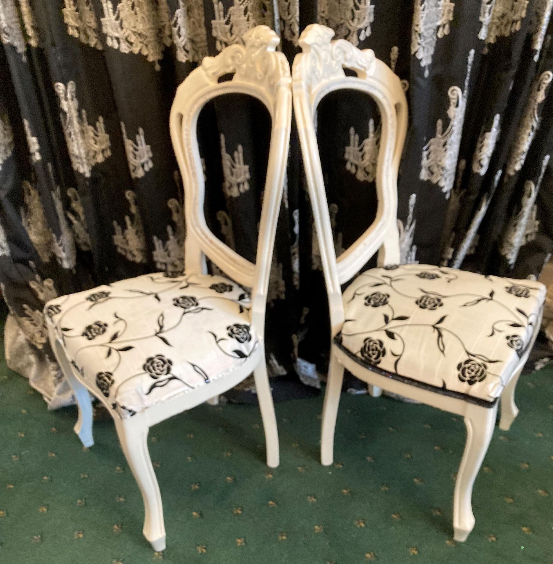 A pair of white painted side chairs with white and black floral fabric seats. - Image 2 of 2