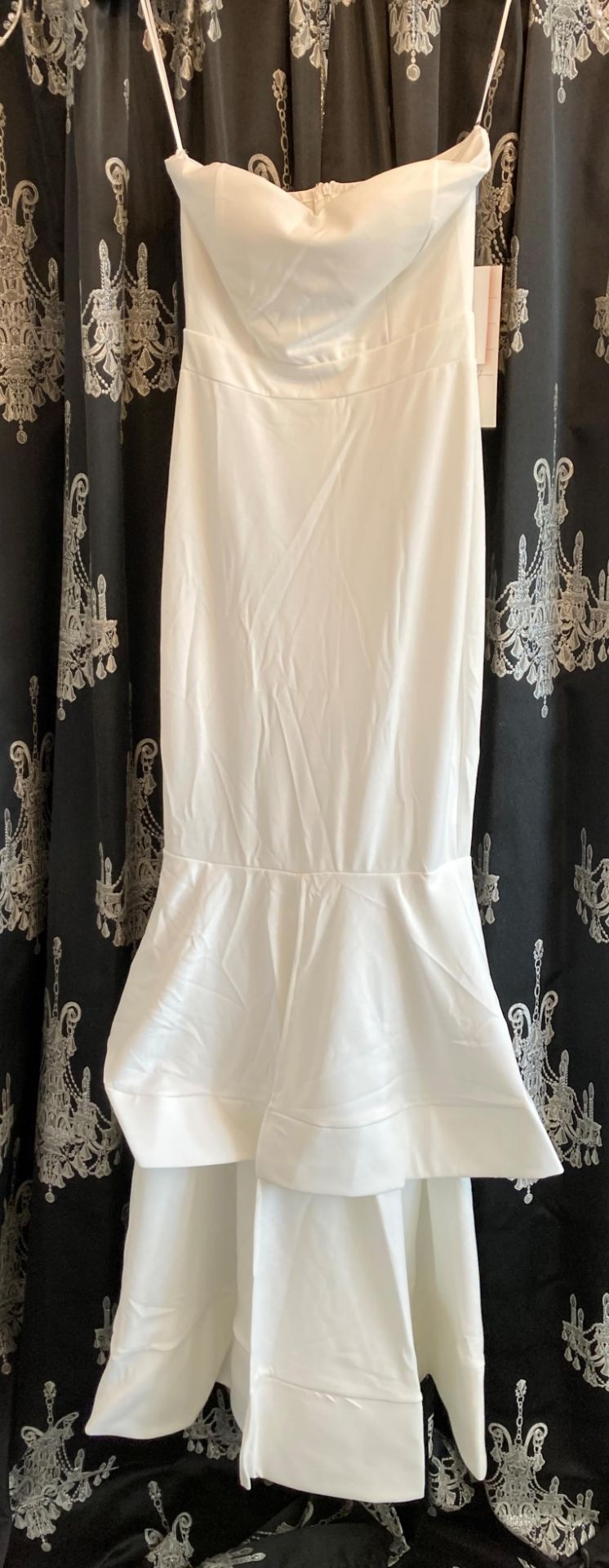 Ivory gown, size UK 8. To be collected from: The Gown Room, 46a Valley Road, Pudsey, LS28 9ER.
