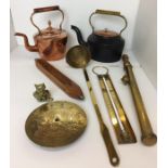 Eight items - copper kettle, iron brass and copper kettle, brass gardener's syringe, wooden shuttle,