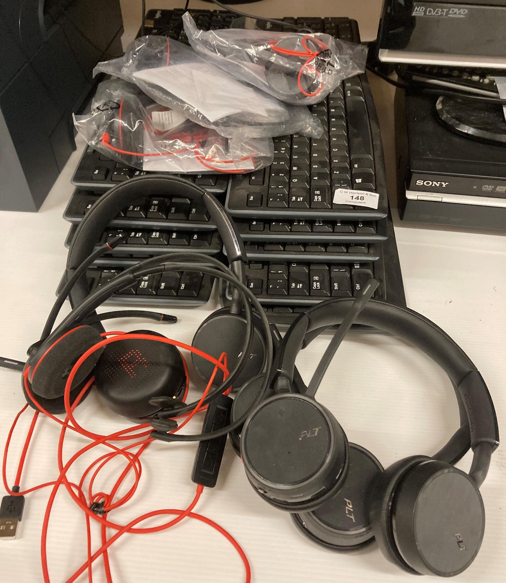 10 x Logitech wireless keyboards (as seen) and 8 x assorted Plantronics and PLT gaming headsets