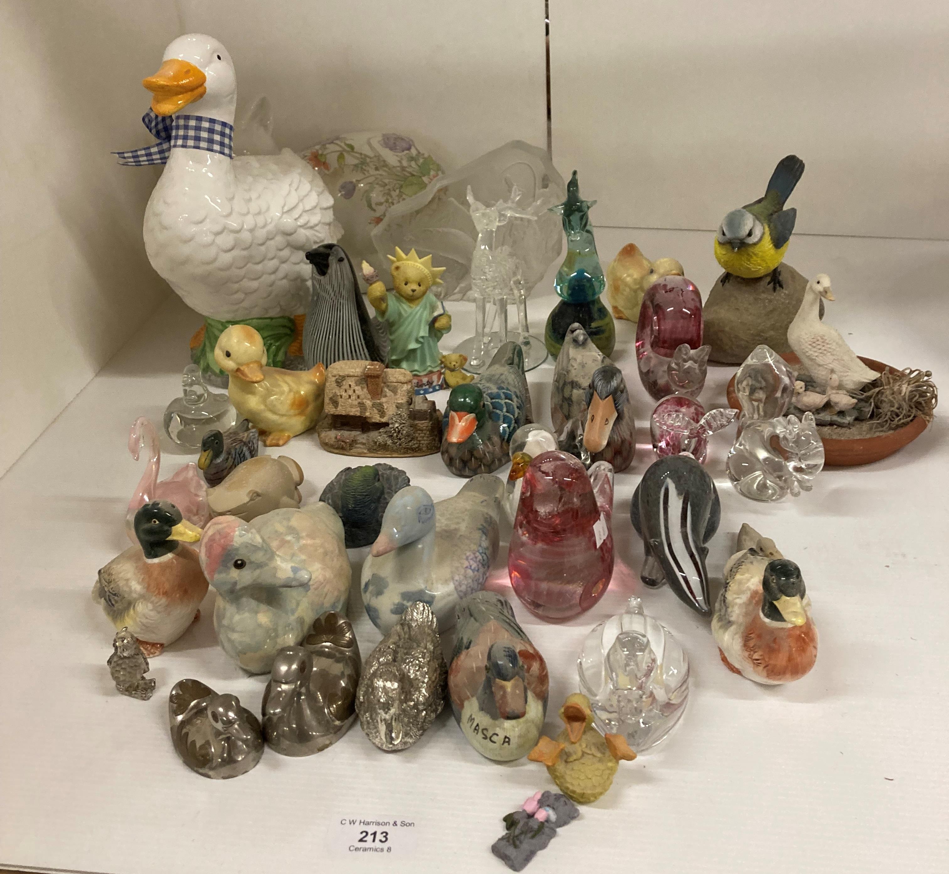 Contents to part of rack - assorted duck and bird ornaments, glass, ceramic and metal,