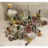 Contents to part of rack - assorted duck and bird ornaments, glass, ceramic and metal,