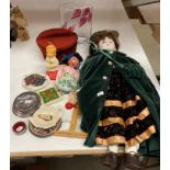 A modern pottery head doll, approximately 50cm long, a Pelham puppet, reproduction railway badges,