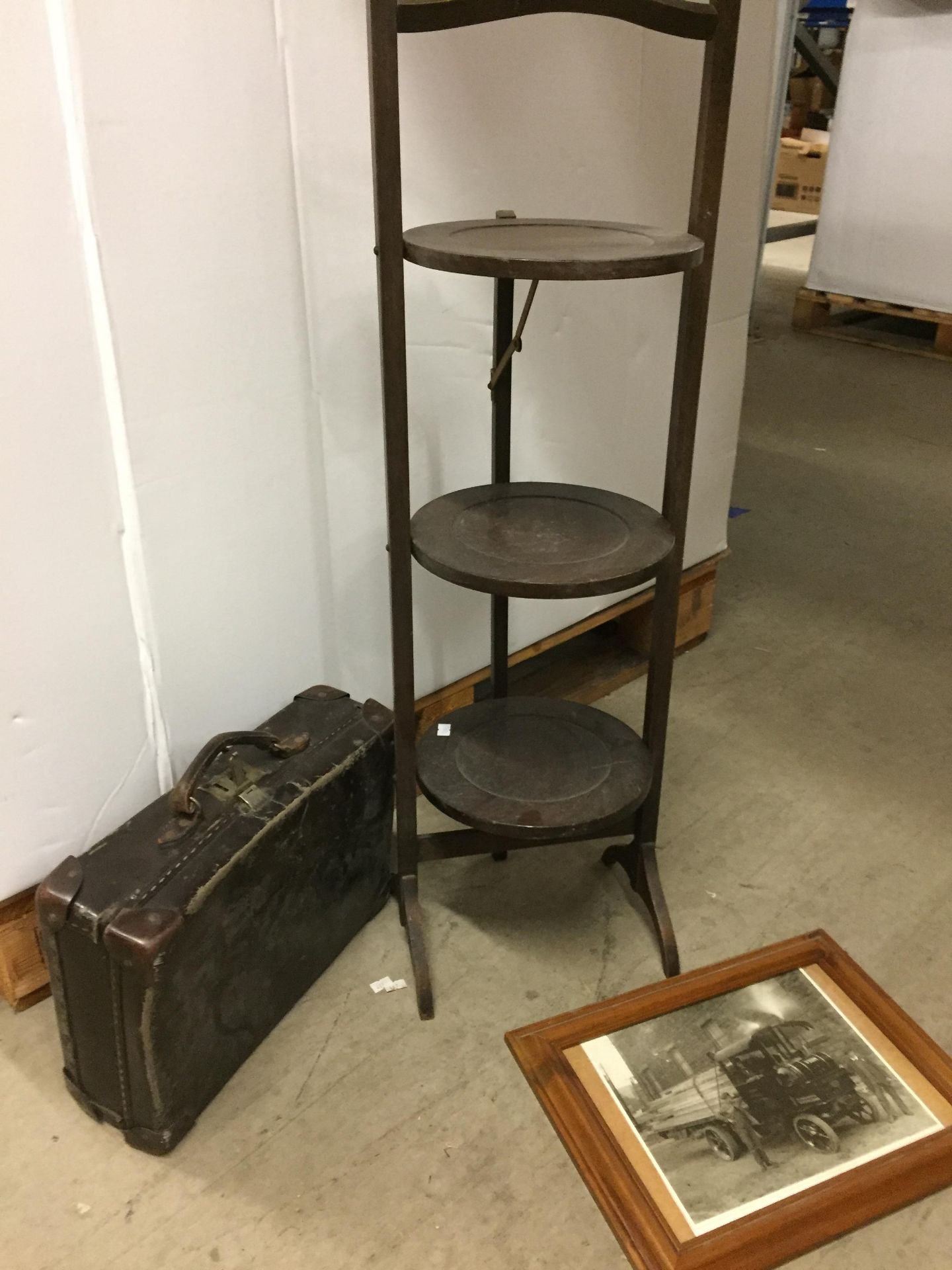 Three items - mahogany three-tier folding cake stand 86cm high,