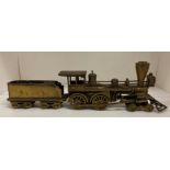 Brass model American style steam train and tender,