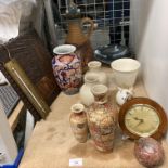 Contents to part of rack - two oriental patterned vases, an Imari patterned vase (repaired),