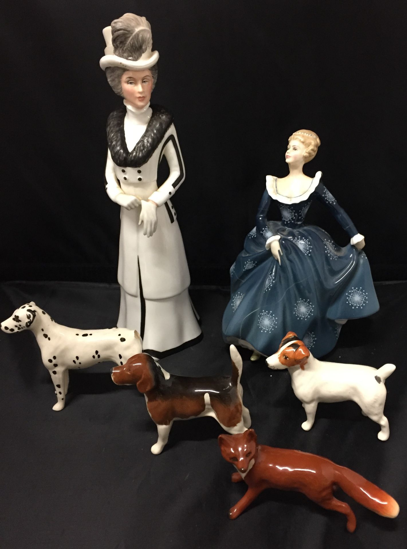 Six items including three Beswick dogs (one with missing tail) and fox,