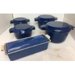 Five pieces of blue enamel cast iron oven to table ware including four casseroles by Nacco of