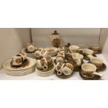 Sixty-eight pieces of Palissy Kismet brown floral patterned tableware - plates, side plates,