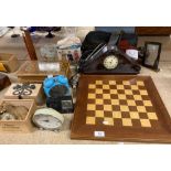 Contents to part of rack - wood chess board, mahogany mantel clock, coloured glass light shade,