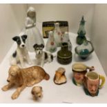 Two Sylvac spaniels, two pottery terriers, two miniature character jugs, etc.