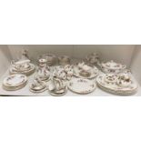 Sixty-eight pieces of Lavender Rose tableware including tea and coffee pots, tureen, plates, cups,