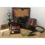 Wooden box containing slide lantern and quantity of slides, microscope and box of slides,