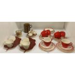 Seventeen pieces of Alfred Meakin red and white patterned part tea service,