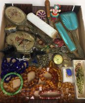 Contents to tray including costume jewellery, pill boxes, brush and mirror sets, watches,