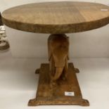 A small wood elephant table 24cm diameter,