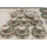 Twenty one pieces of Paragon Tree of Kashmir tea service including cake plate,