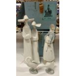 Four pieces of Lladro, two nuns, 33cm high, a girl holding a sheep, 27cm high,